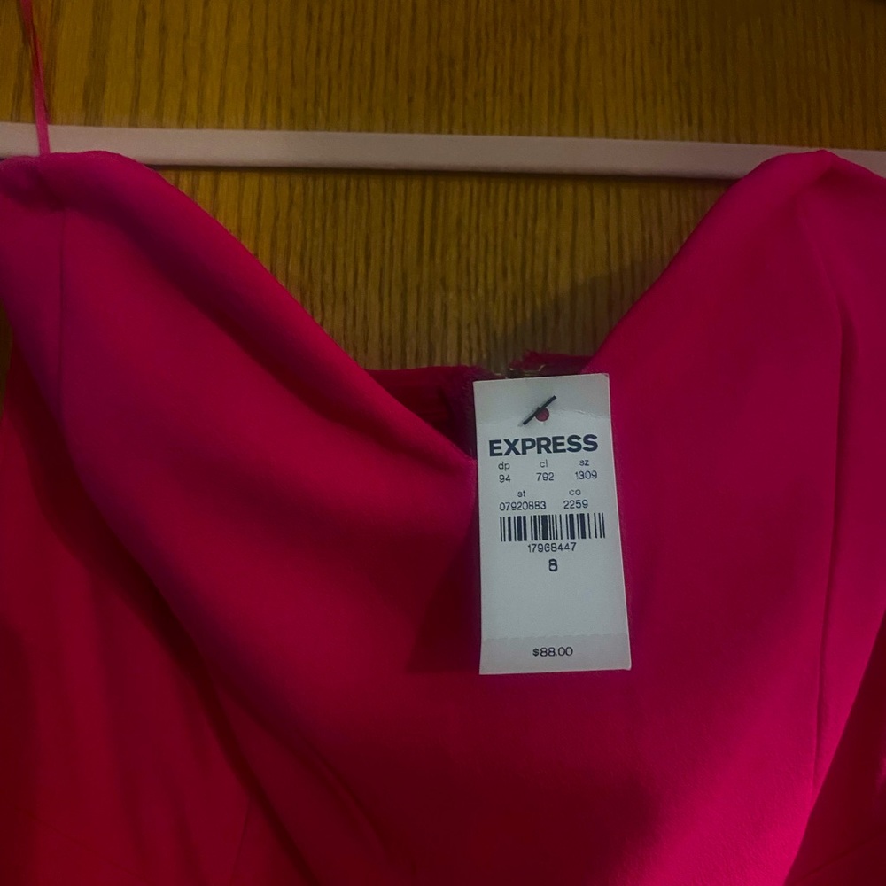 NWT Express , sweetheart neckline pink jumpsuit.